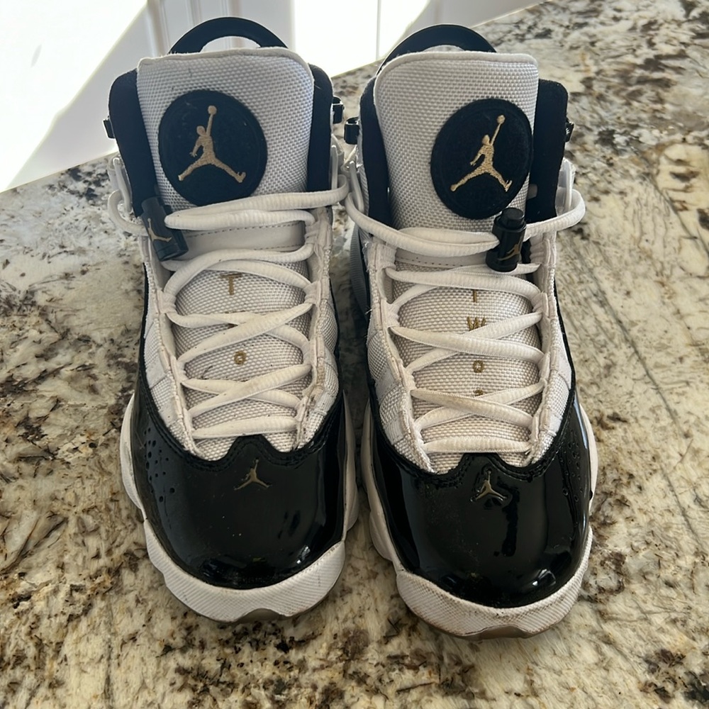 Black,White,and Gold Jordan 6 rings concord. 4.5Y